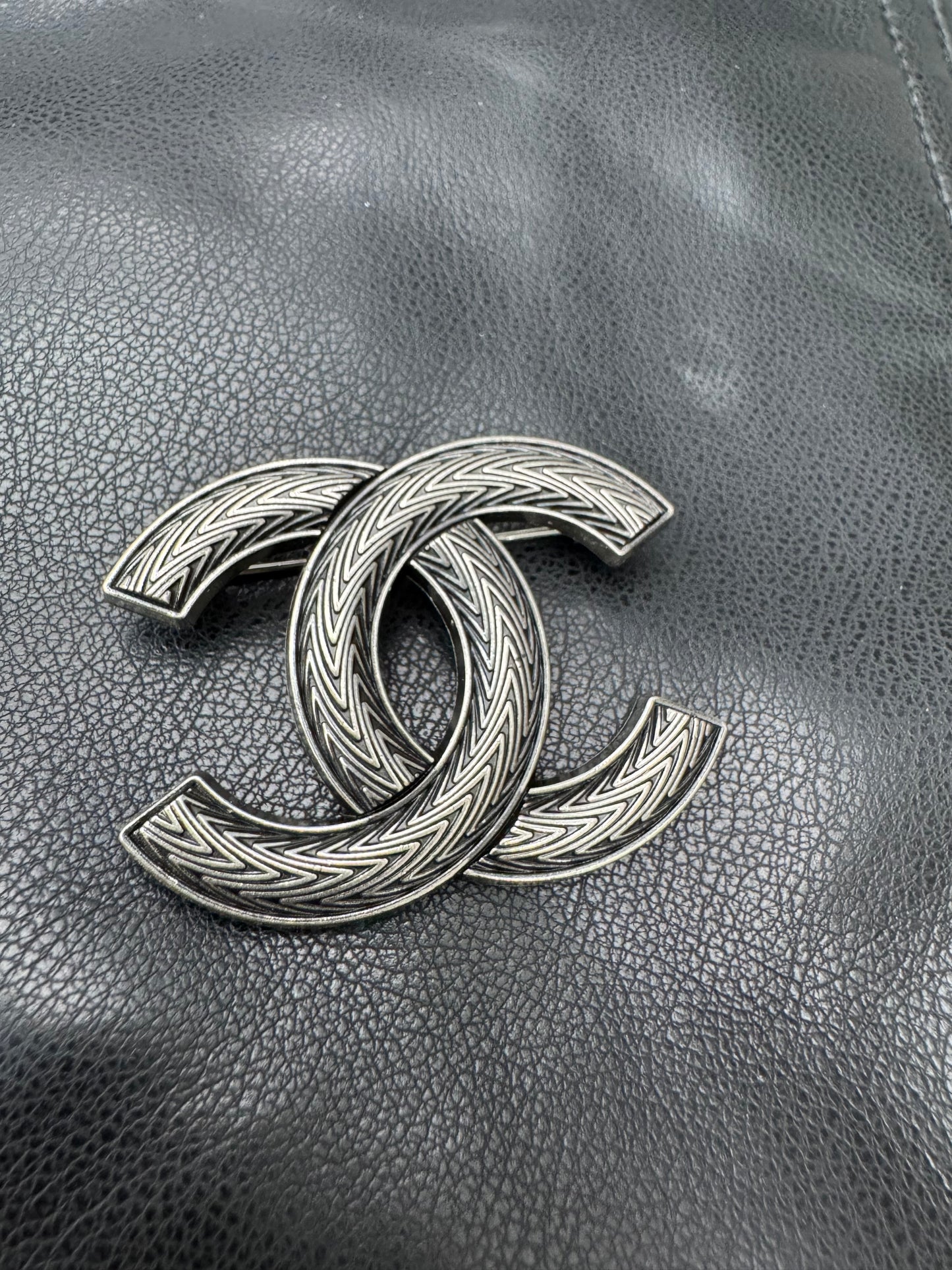 CC brooch