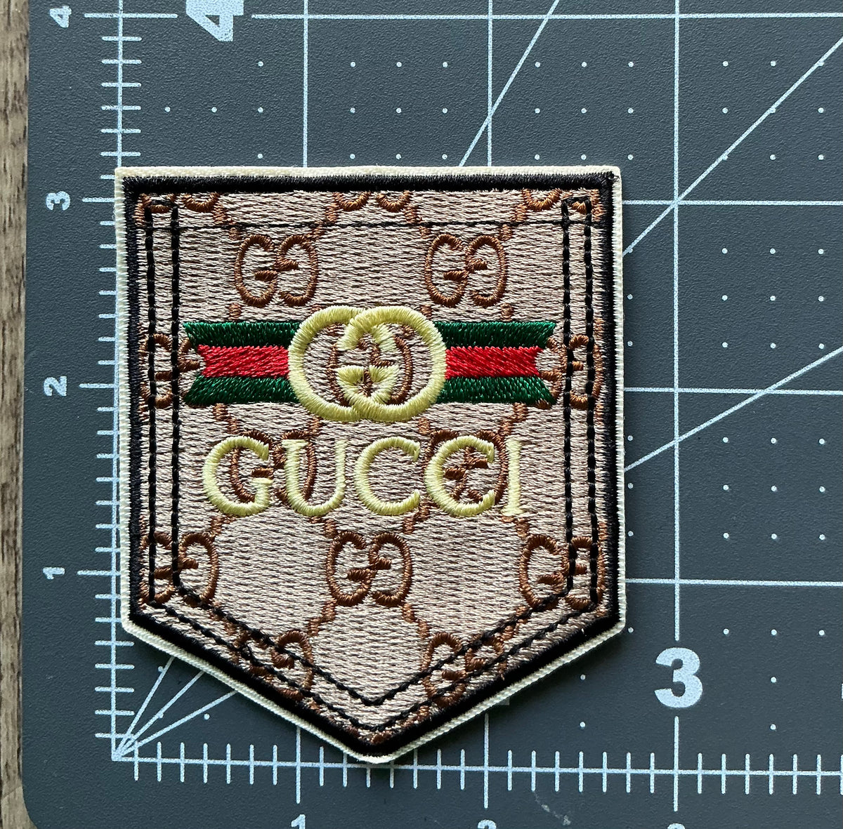 GG brown pocket iron on patch