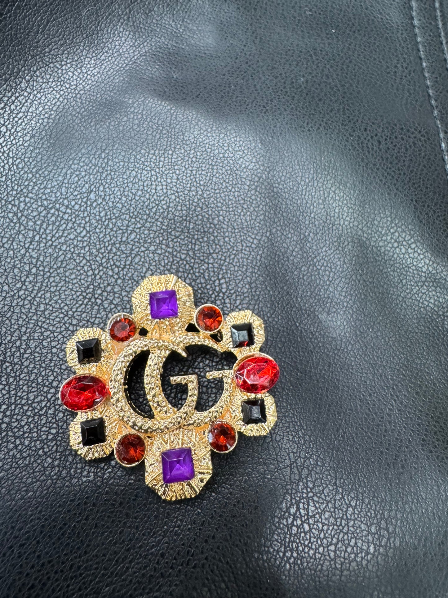 GG brooch