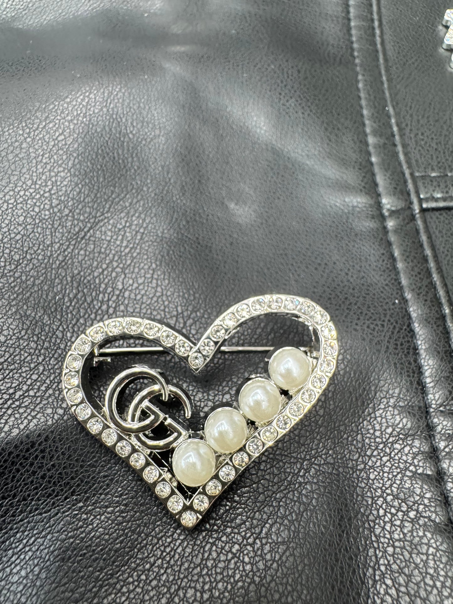 GG brooch