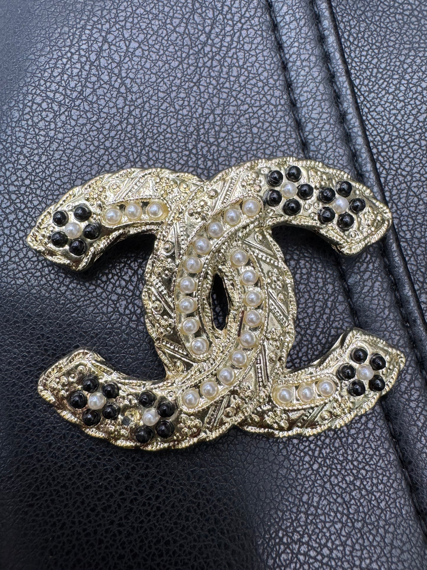 CC brooch