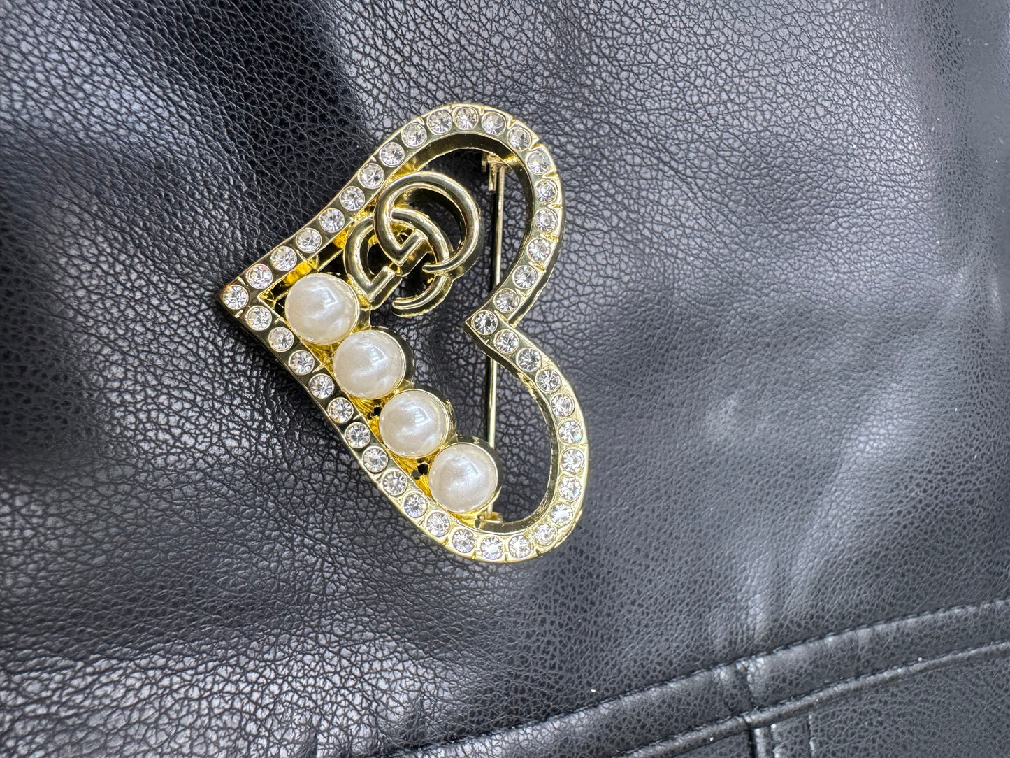GG brooch