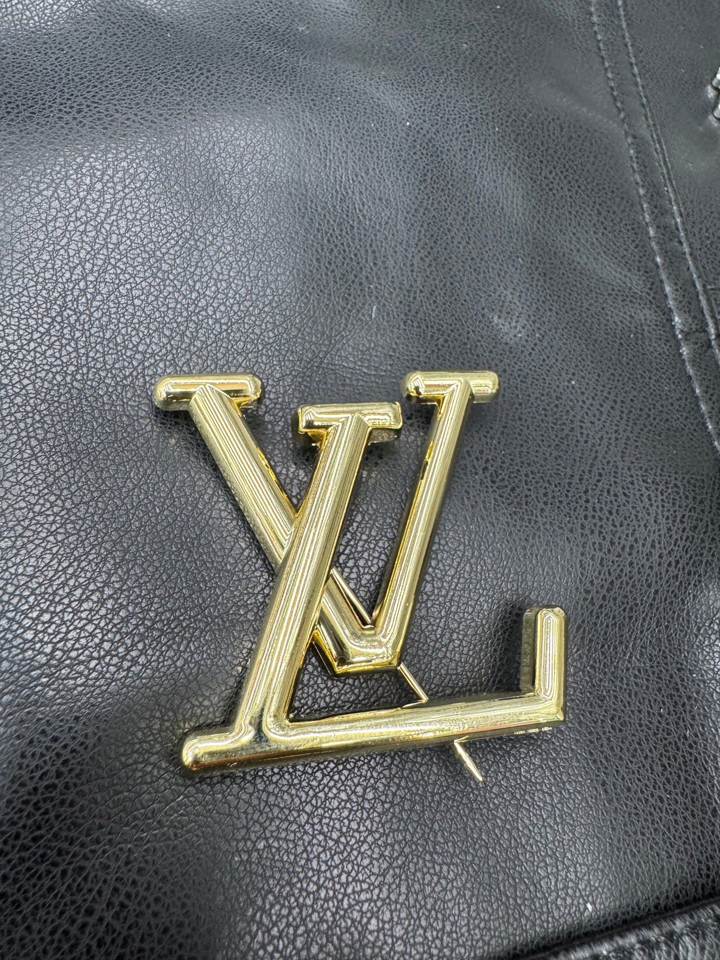 LV brooch