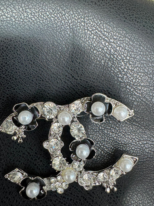 CC brooch