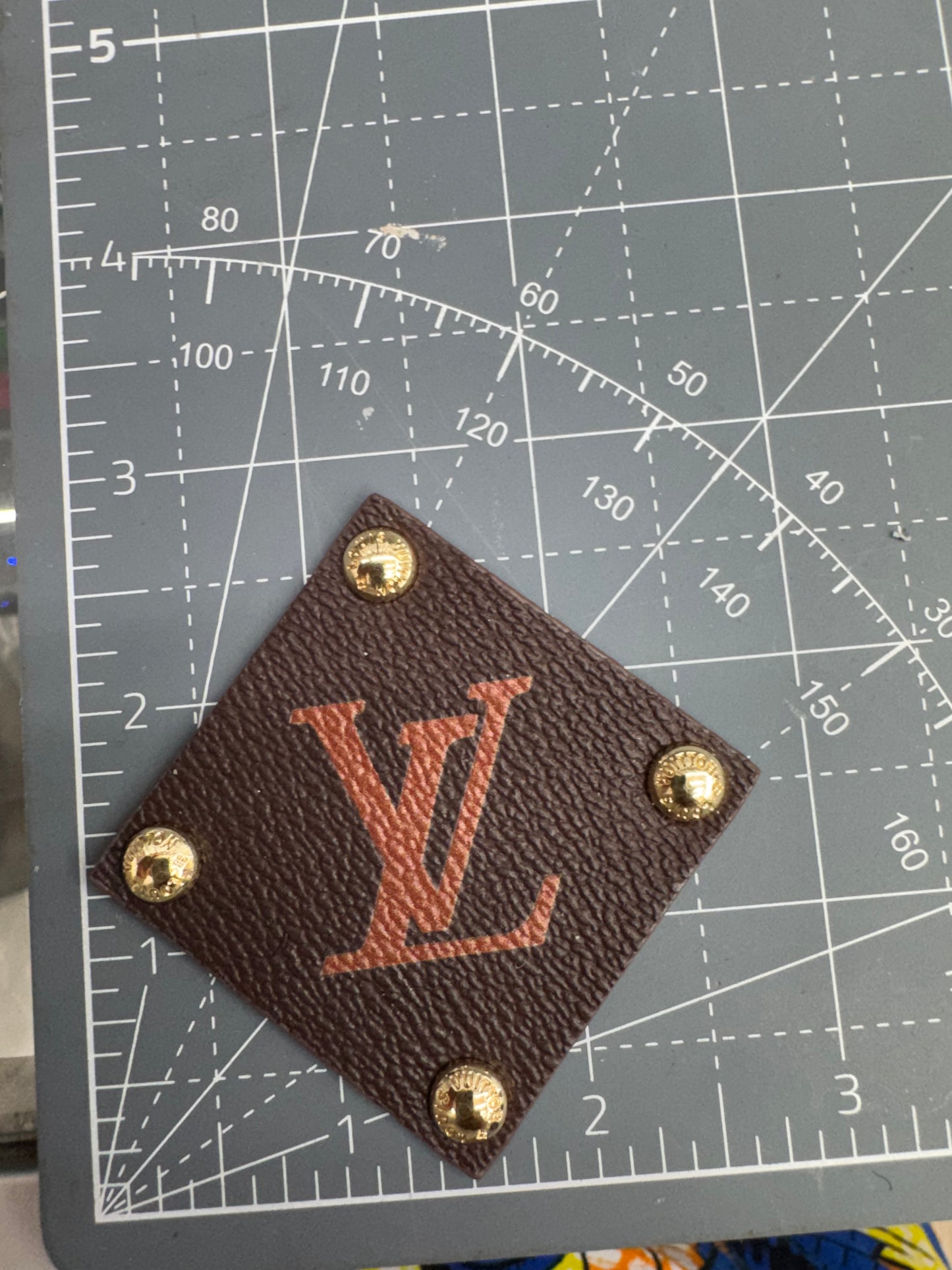 LV patch w/ studs (NOT IRON ON)