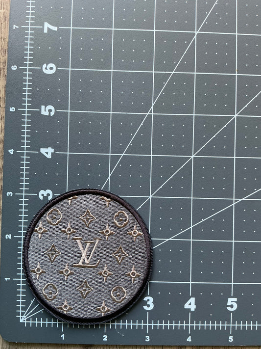 LV iron on patch
