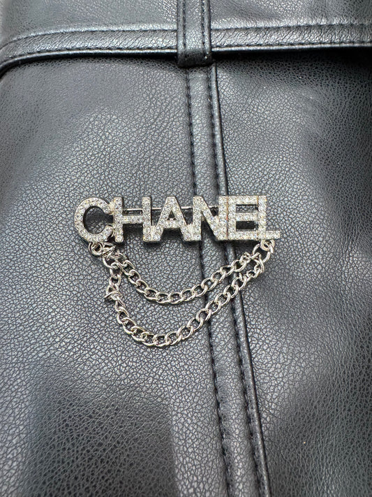 CC brooch
