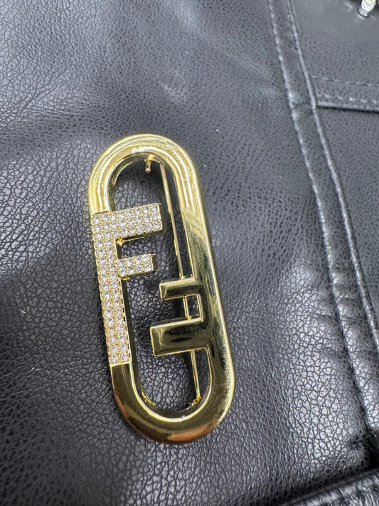 FF brooch