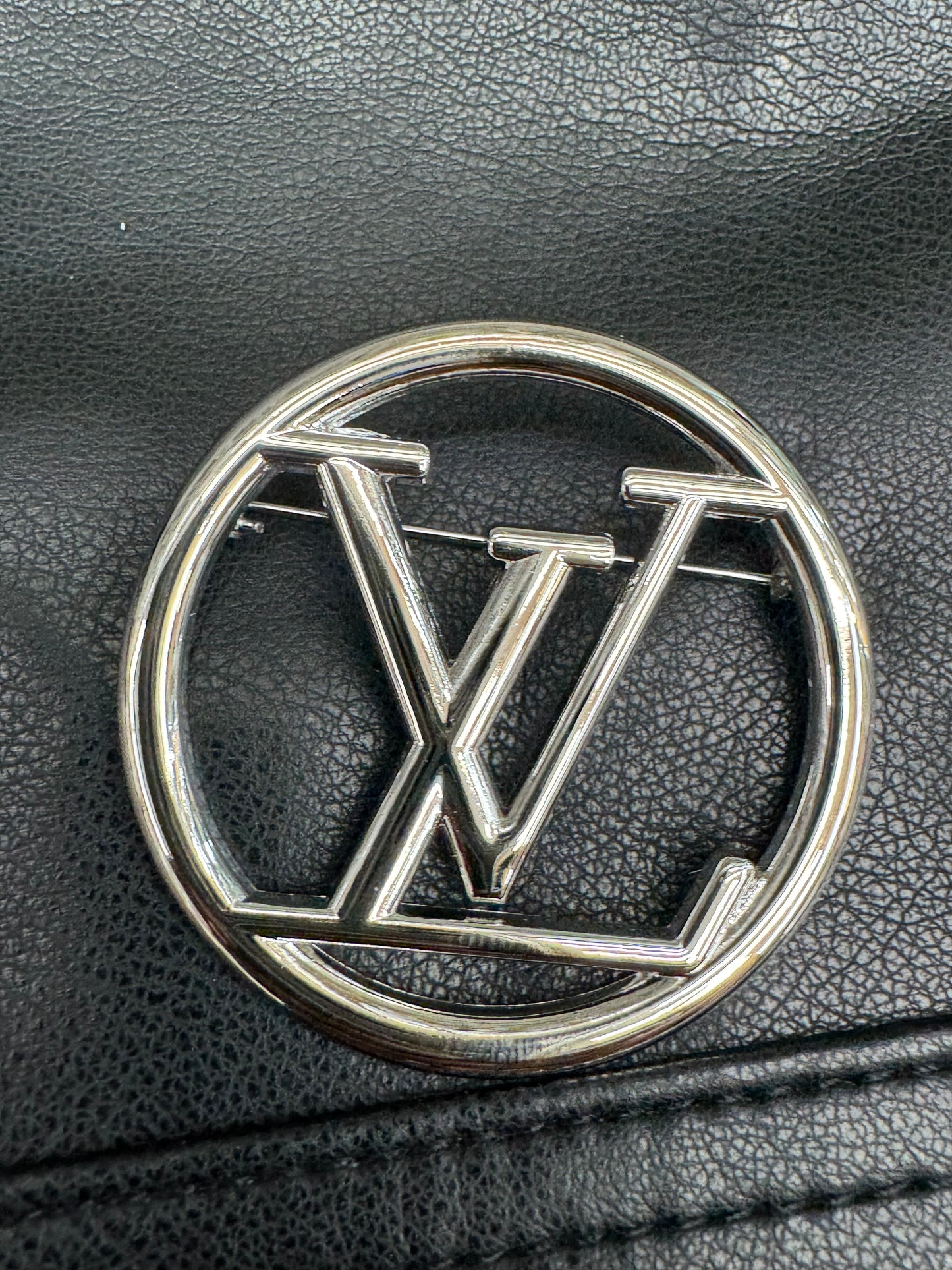 LV brooch