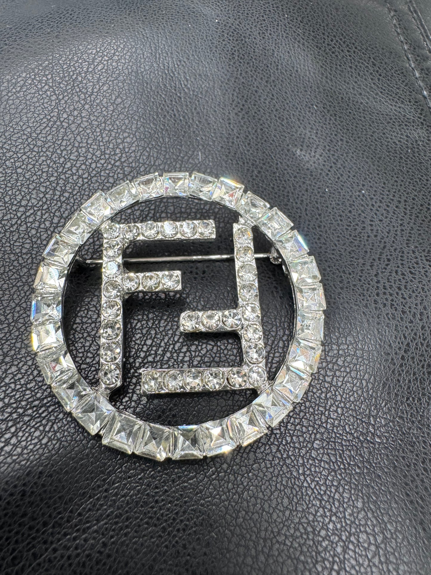 FF brooch