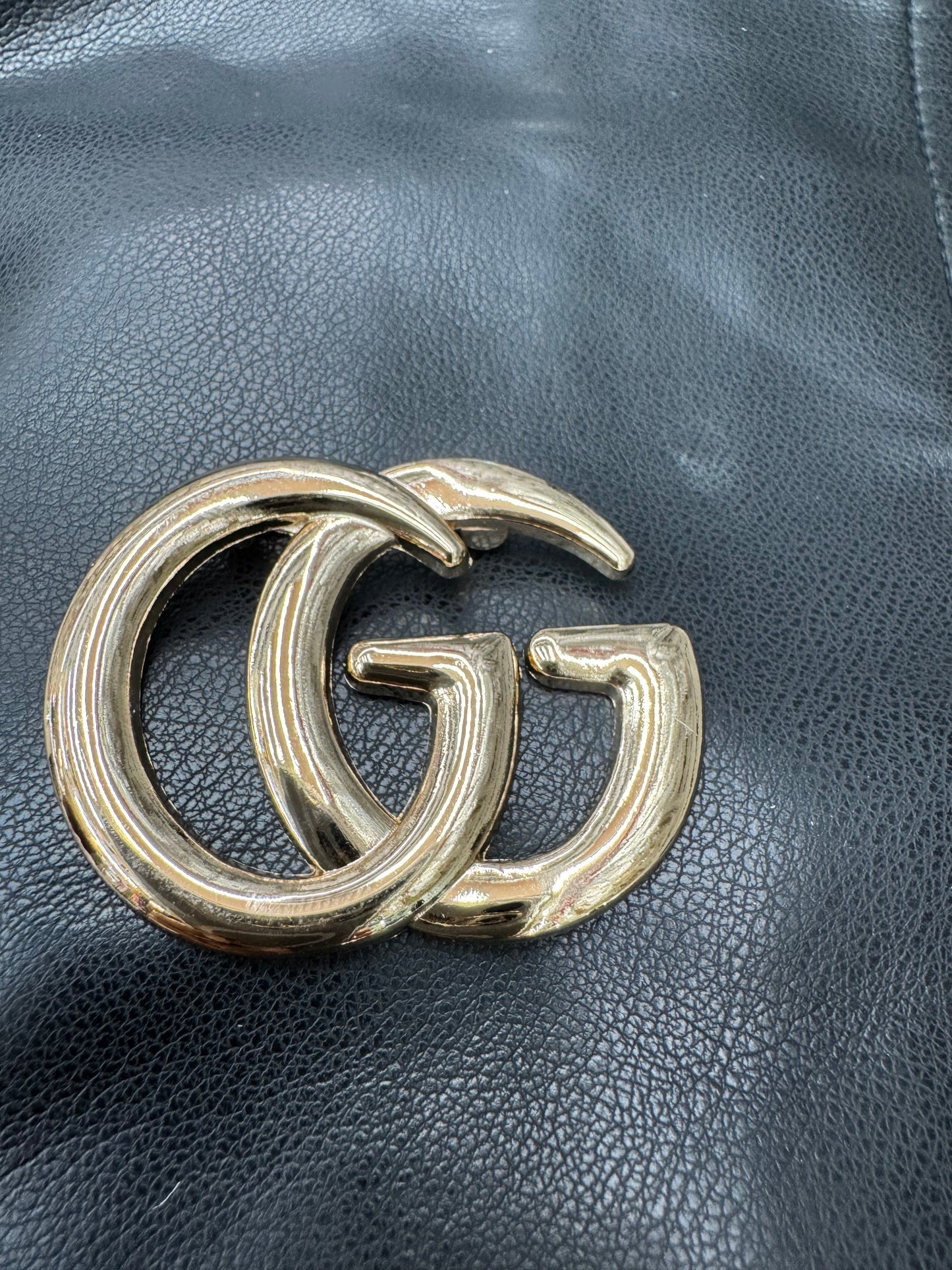 ￼GG brooch