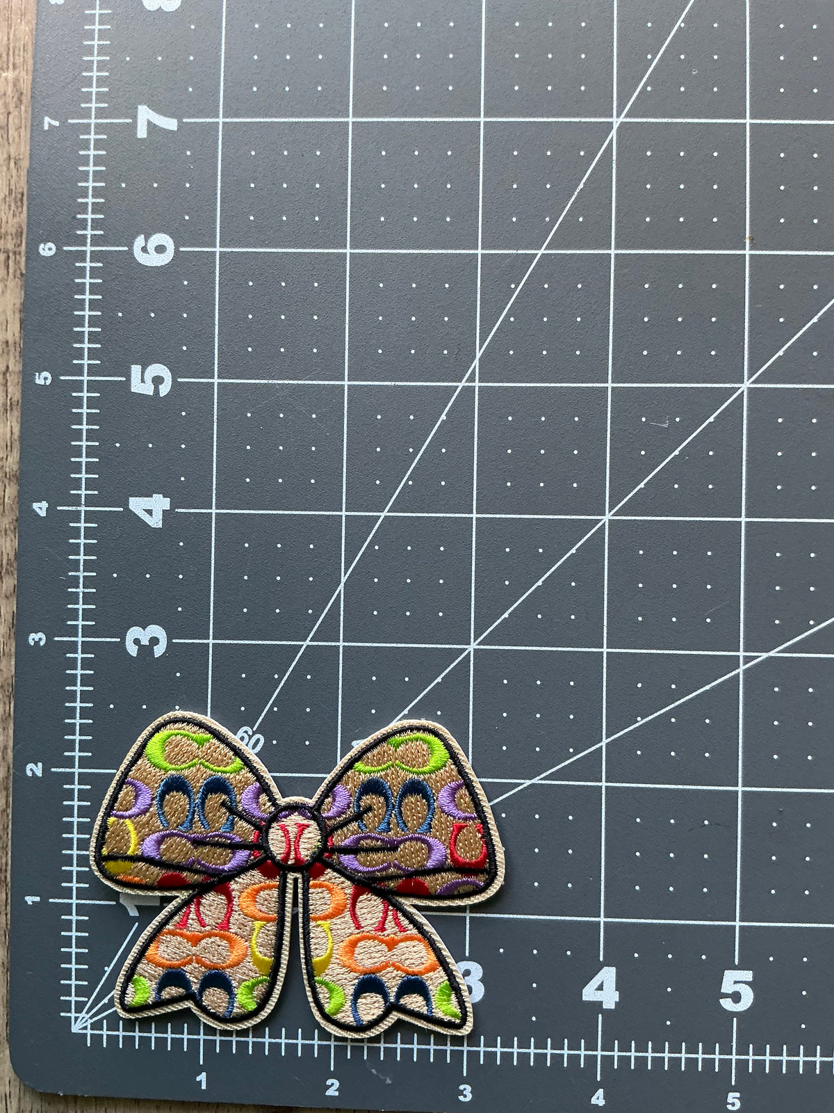 Multicolor coach bow iron on patch ￼