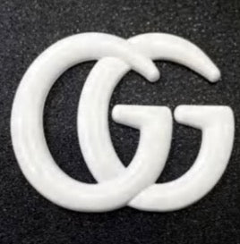 GG emblem catalog in gold and black